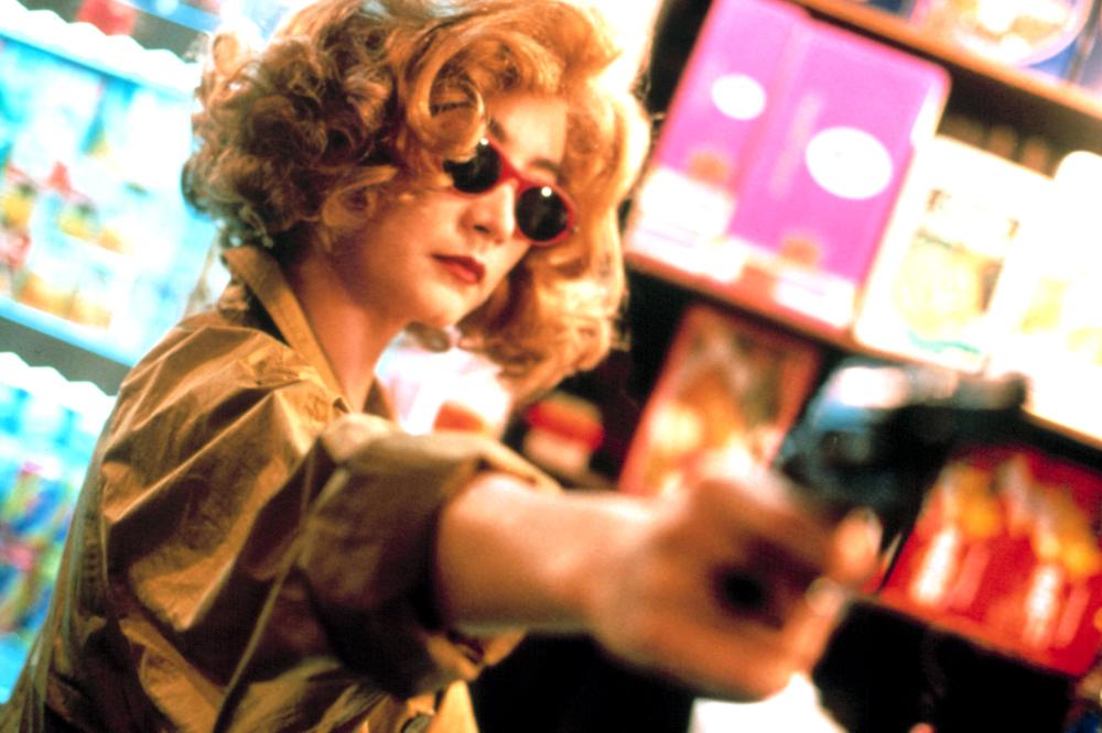 Mysterious Woman with a Gun